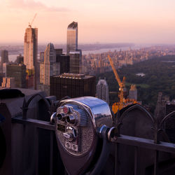 Coin-operated binoculars in city