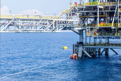 View of bridge over sea against sky