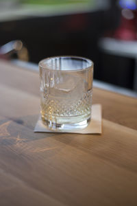 Close-up of beer glass on table