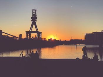 View of factory at sunset