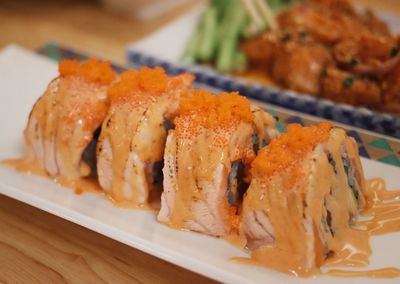 Close-up of sushi in plate on table