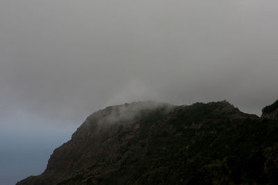 Low angle view of mountain against sky