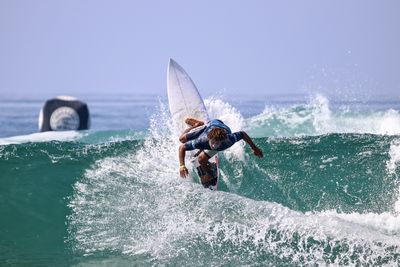 Man surfing in sea