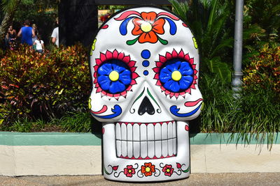 Close-up of multi colored people in park