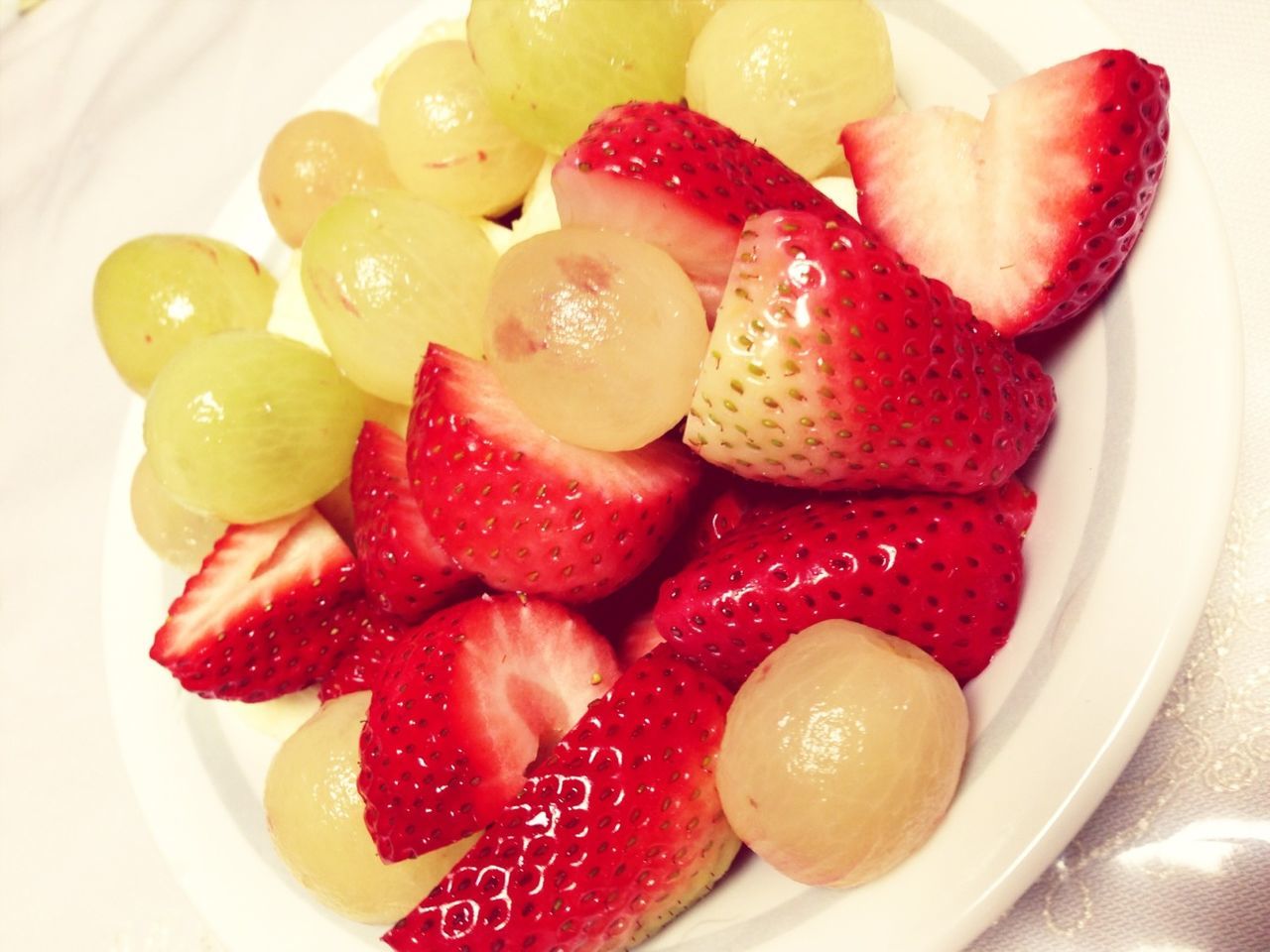 food and drink, food, freshness, indoors, healthy eating, fruit, still life, strawberry, red, sweet food, ready-to-eat, close-up, plate, indulgence, high angle view, slice, bowl, raspberry, dessert, no people