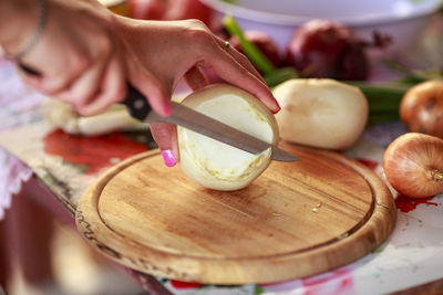 Close-up of hand holding ice cream