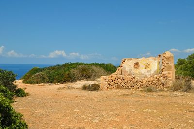 Ruins of building against sky