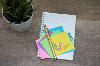 High angle view of paper on table