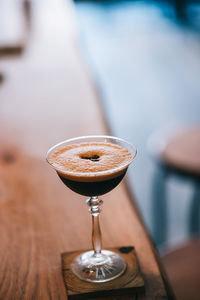 Close-up of wineglass on table