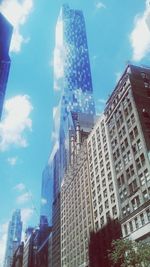 Low angle view of modern building against sky