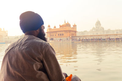 Man praying at golden temple