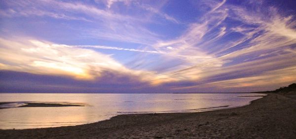 Scenic view of sea at sunset