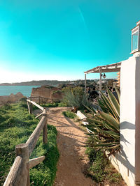 Panoramic view of landscape against clear blue sky