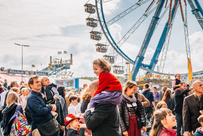 People enjoying in amusement park