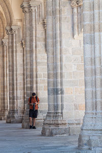 Couple standing at historical building