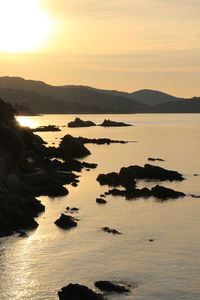 Scenic view of sea against sky during sunset