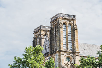 Low angle view of historical building against sky