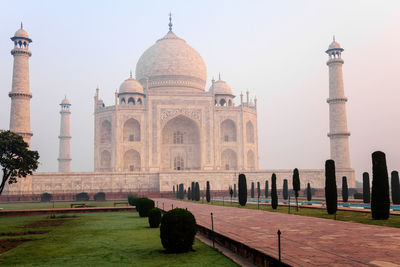 Taj mahal against sky during sunset