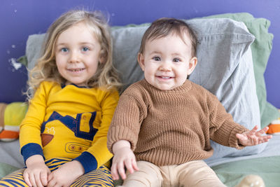 High angle view of mother and daughter at home