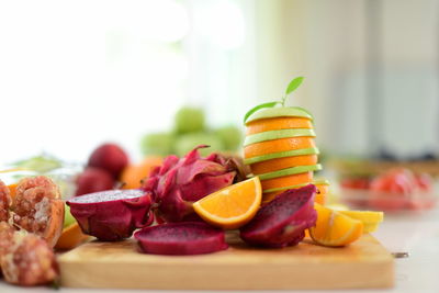 Close-up of fruits in plate on table