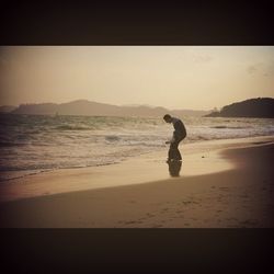 Scenic view of sea at sunset