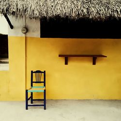 Empty chairs in front of building