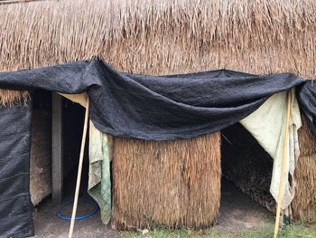 Close-up of clothes drying on roof of building