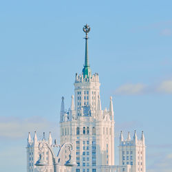 Low angle view of building against blue sky