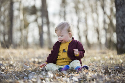 Toddler with down syndrome sticking out tongue