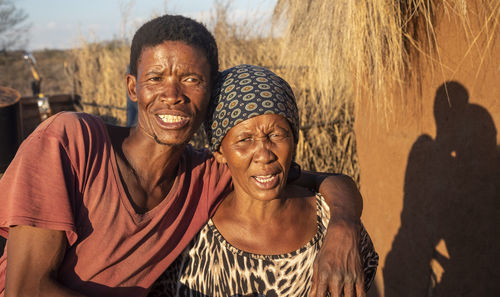 Portrait of smiling man with woman