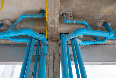 High angle view of blue pipe against wall