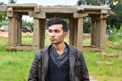 Portrait of man standing outdoors