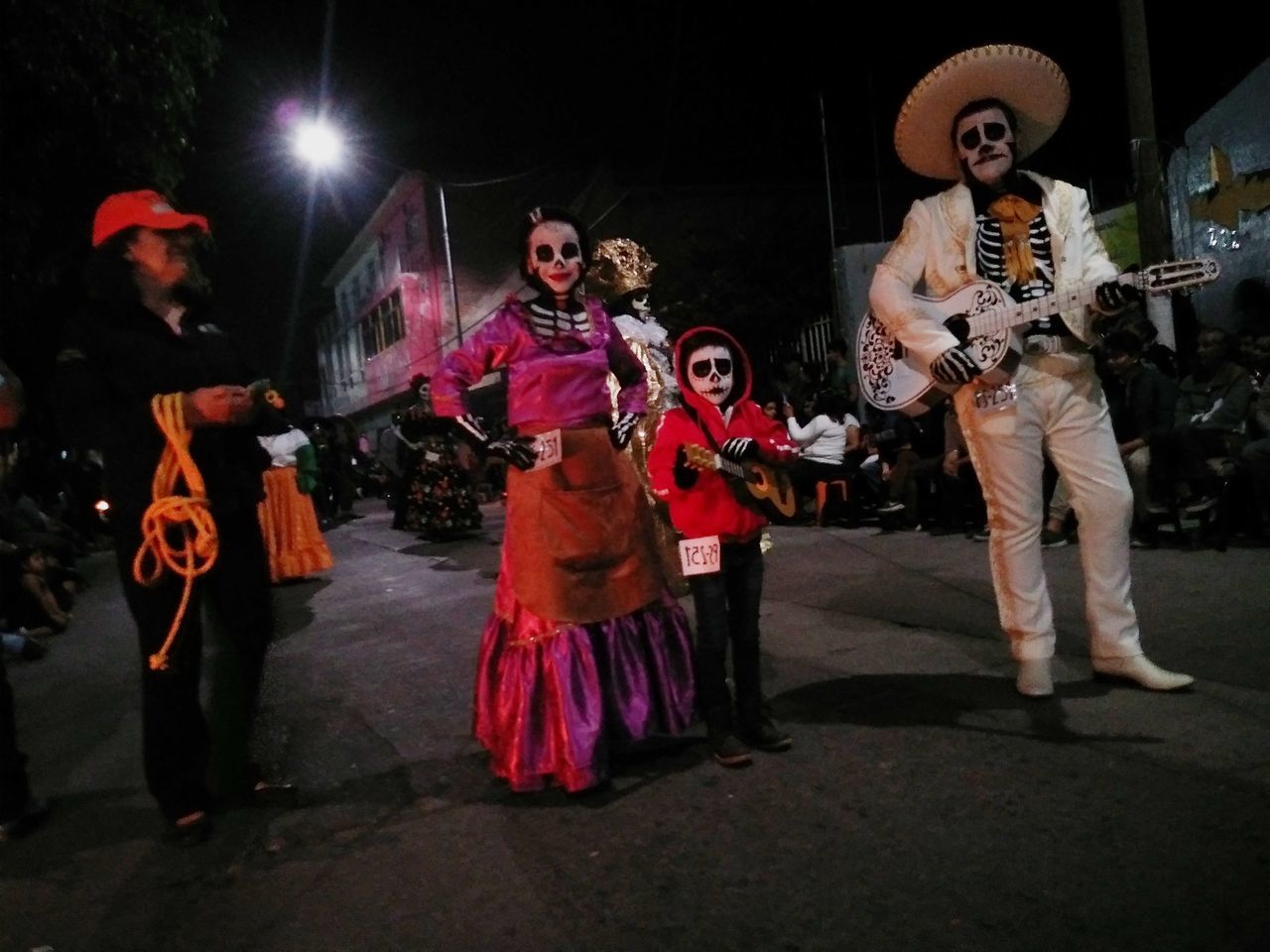 GROUP OF PEOPLE AT STREET