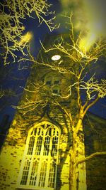 Low angle view of built structure at night