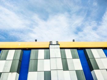 Low angle view of building against blue sky