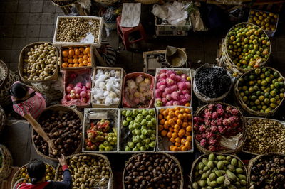 Various fruits for sale at market stall