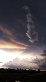 Scenic view of dramatic sky over land