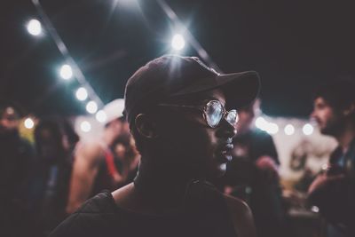 Blurred motion of illuminated people at night