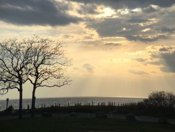 Scenic view of sea against sky at sunset