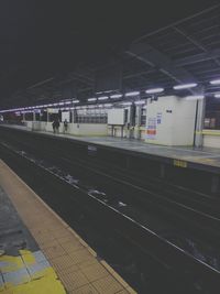 Railroad tracks at night