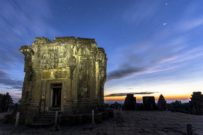 Old ruins against sky at night