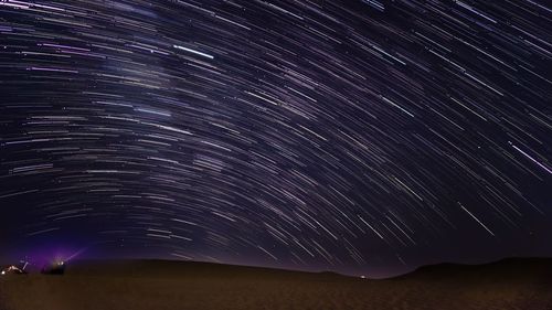 Star trails caught in the middle of the desert of abu dhabi