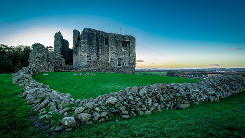 Castle against sky during sunset