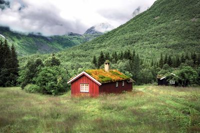 House on field against sky