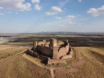 Panoramic view of old ruins against sky