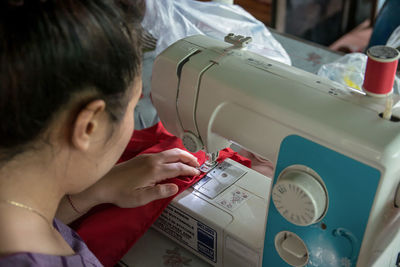 High angle view of woman working on table