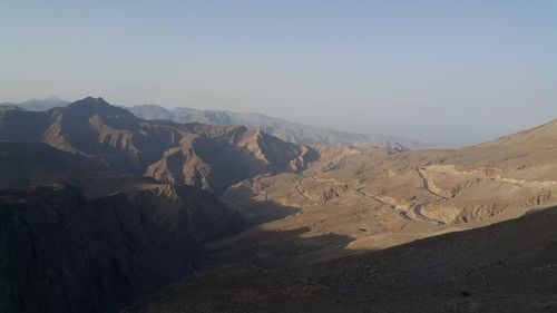 Scenic view of desert against clear sky