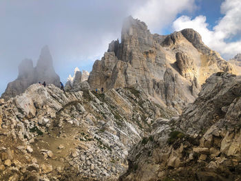 Scenic view of rocky mountains against sky