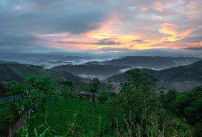 Scenic view of mountains against sky during sunset