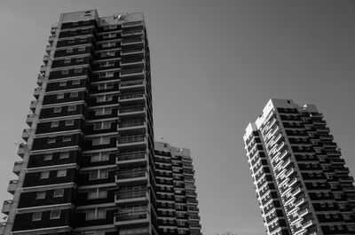 Low angle view of buildings against clear sky